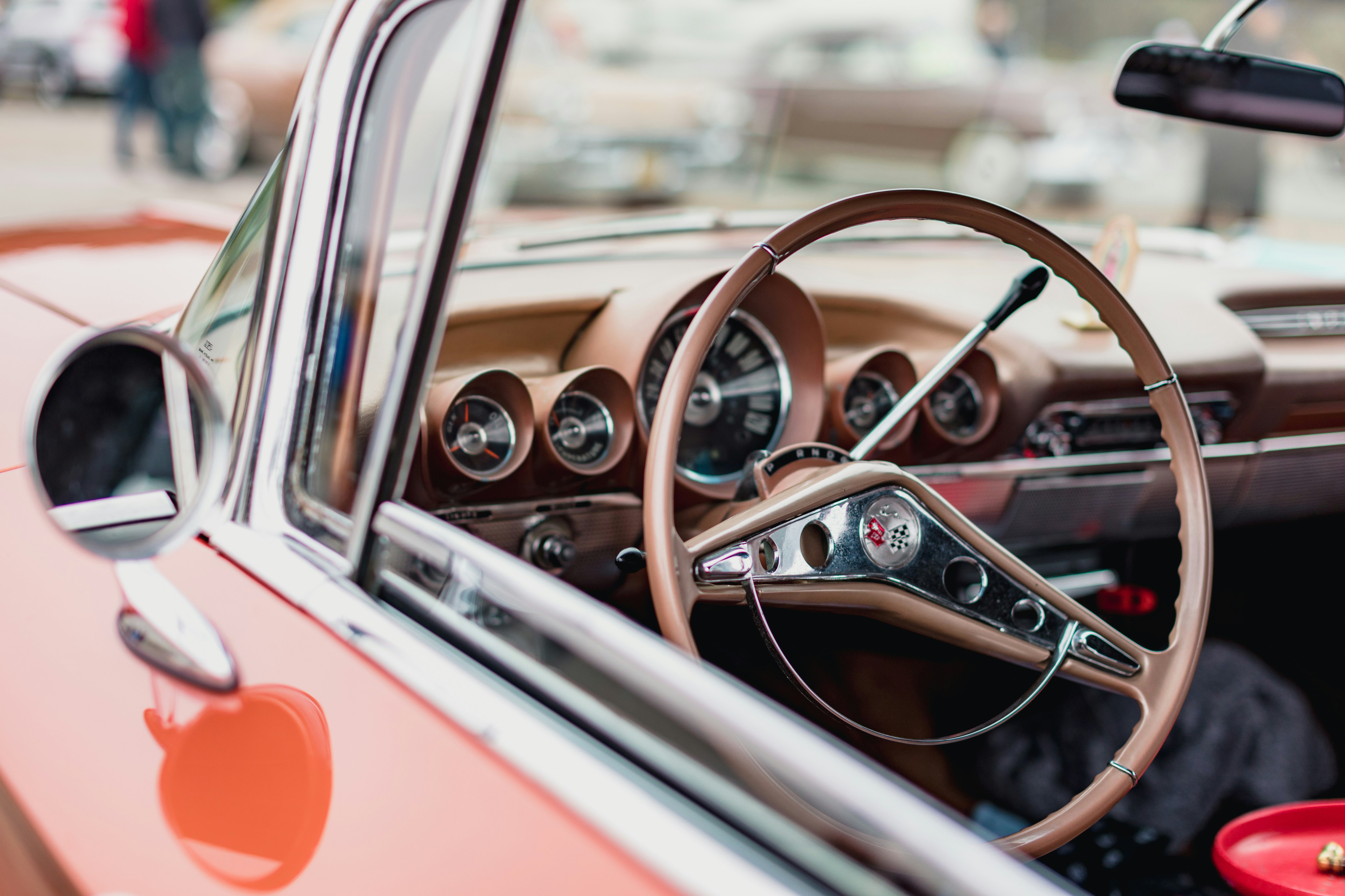 black and red car steering wheel